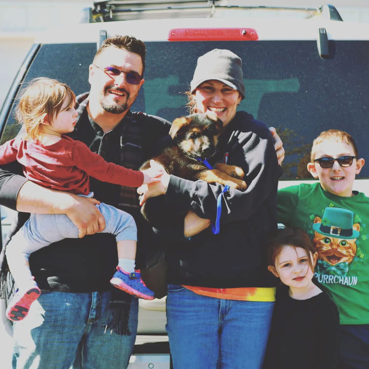 Happy family with their German Shepherd from Haus Von Wolfgang Mojica